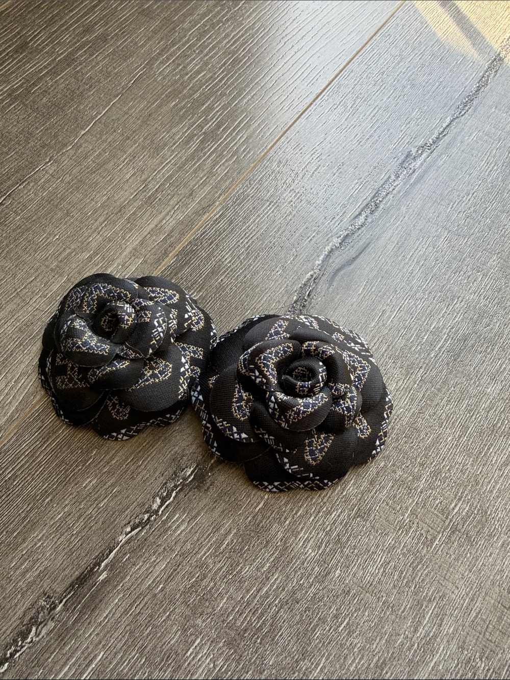 2 Chanel seasonal Camellia Brooch in black / white with gold glitter